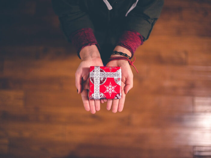 Small Gift wrapped in a person's hands