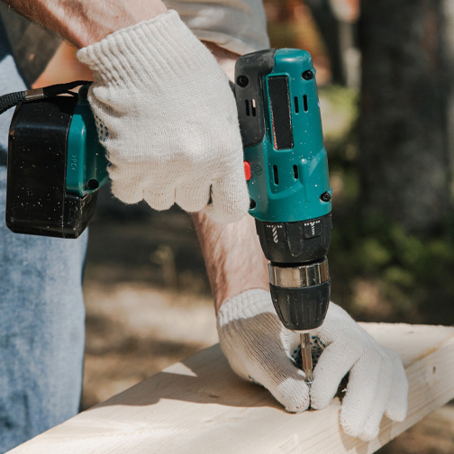 Person Using A Power Tool